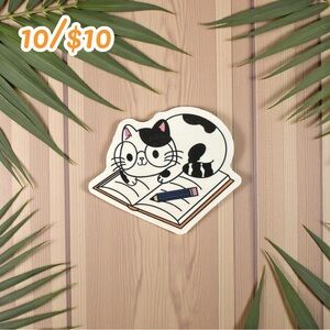 Cat on Open Book Sticker – Black & White Kitty with Pencil – 2” Glossy Vinyl